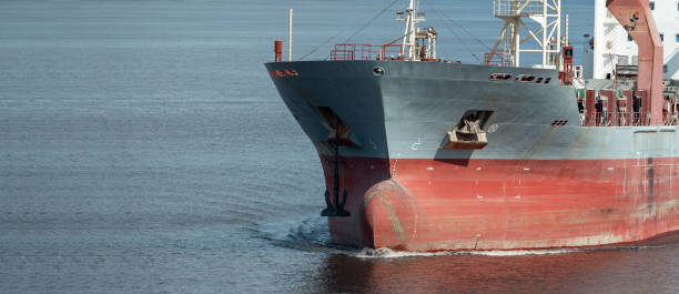 istock Closeup of multipurpose ship bulbous bow underway. 1279557580