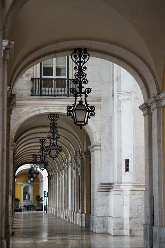 View of vintage street light alignment  in the commerce square corridor in Lisbon