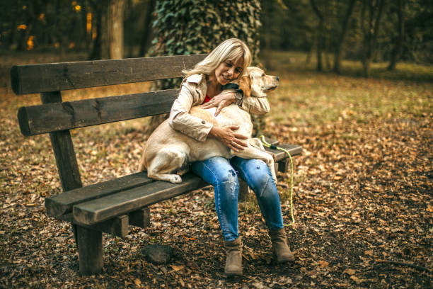 istock woman walking with her dog 1279561673