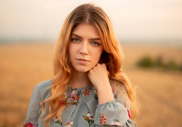 istock Pretty female in summer field 1279564481
