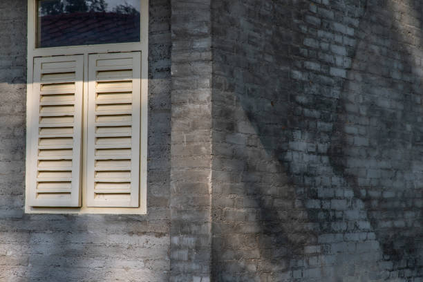 istock Traditional window with wooden shutters. 1279564726