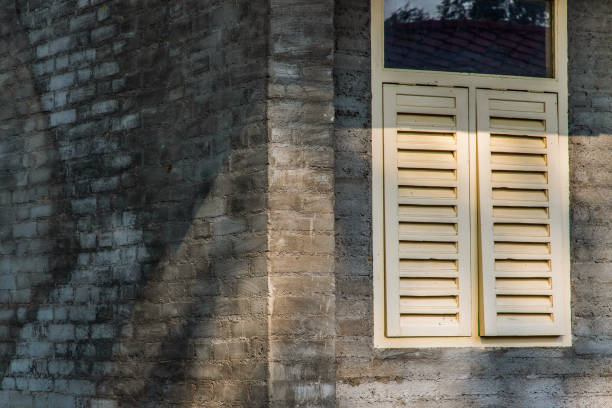 istock Traditional window with wooden shutters. 1279564738