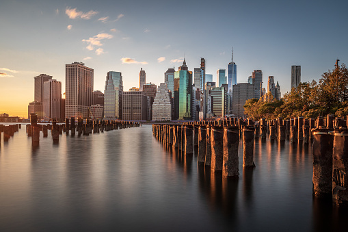 Lower Manhattan shot from Brooklyn. Pilings in the foreground. Brooklyn, NY. USA