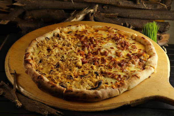 istock delicious giant large two flavor pizza 1279572726