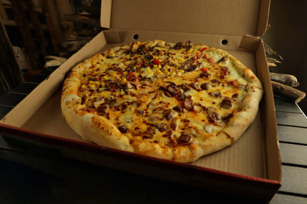 istock delicious giant large two flavor pizza 1279572767