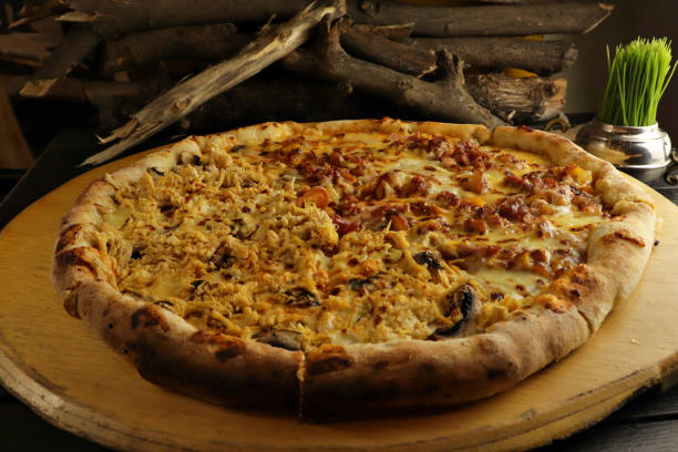 istock delicious giant large two flavor pizza 1279572817