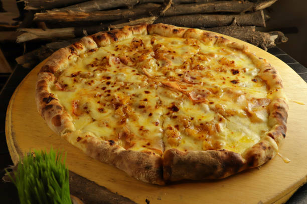 istock delicious giant large two flavor pizza 1279573420