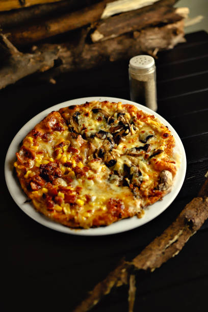 istock delicious giant large two flavor pizza 1279574167