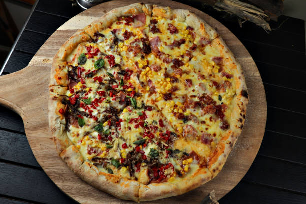istock delicious giant large two flavor pizza 1279577159