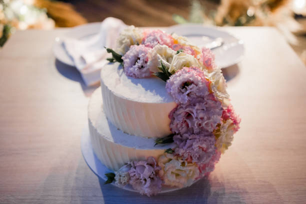 istock wedding cake near the arch in the evening 1279588377