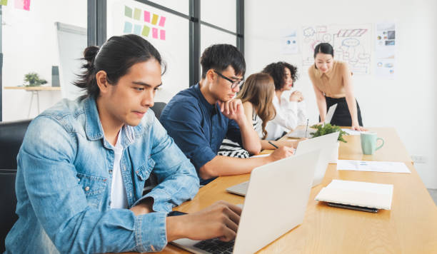 istock Asian business people working with laptop, searching data for business startup plan and strategy 1279589340