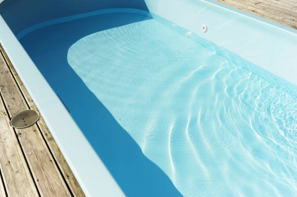 istock drain water in home blue pool for cleaning, pool care, selective focus 1279593394