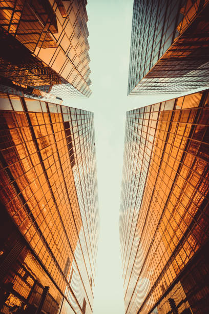 istock Symmetrical mirrored office buildings stock 1279595392