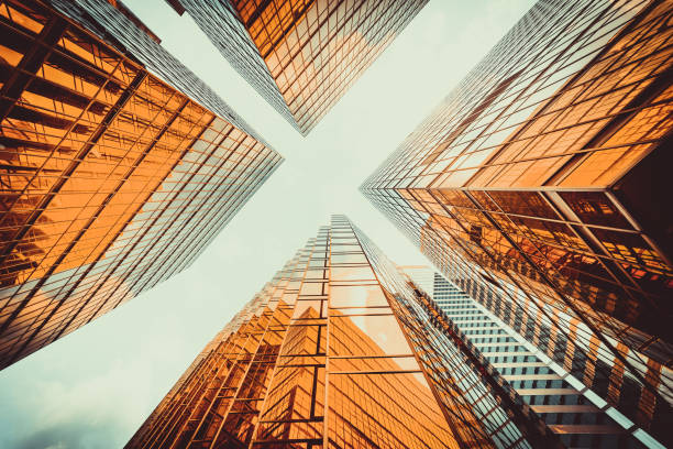 istock Symmetrical mirrored office buildings stock 1279595403