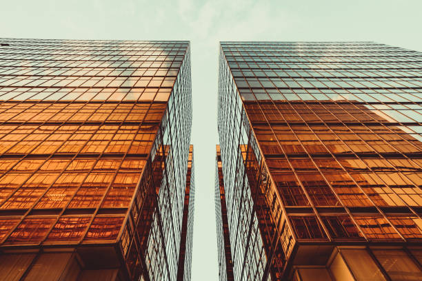 istock Symmetrical mirrored office buildings stock 1279595408