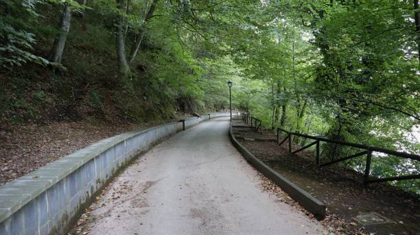 istock Monticchio - Small Road that surrounds Lake Piccolo 1279596248