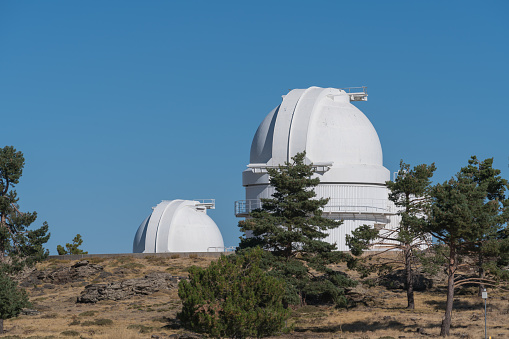 Astronomical Observatory of Calar Alto in southern Spain, there are pine forests and the sky is clear