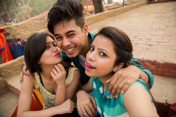 friends enjoying - stock photo Indian, Indian ethnicity, modern, friends, adults, youth culture, three way kiss stock pictures, royalty-free photos & images