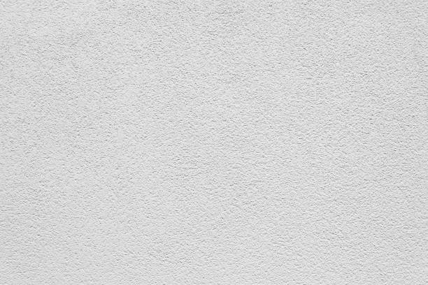 istock White cement and concrete texture background, stucco plaster wall 1279606894