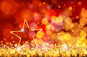 istock Gold star on defocused lights. Blue and gold bokeh decoration 1279611363