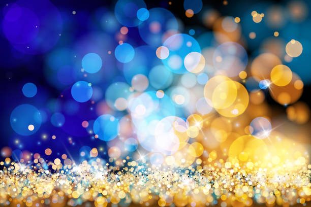 christmas lights defocused background - gold blue bokeh - backgrounds christmas gold celebration stock-grafiken, -clipart, -cartoons und -symbole