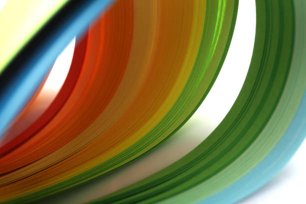 istock Abstract gradient rainbow color wave curl strip paper background. 1279621201