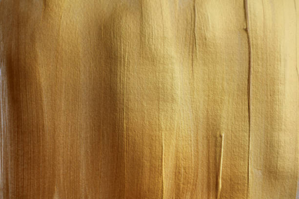 istock Abstract gold (bronze) glittering color surface. Paint smear brush stroke stain texture. 1279621254