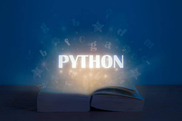 Python inscription above open book. Light coming from open book with words python. Education concept. Learn programming language. Python inscription above open book. Light coming from open book with words python. Education concept. Learn programming language. python programming language photos stock pictures, royalty-free photos & images