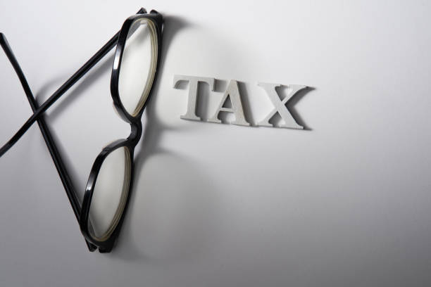 istock eyewear and single word tax on white background 1279624105