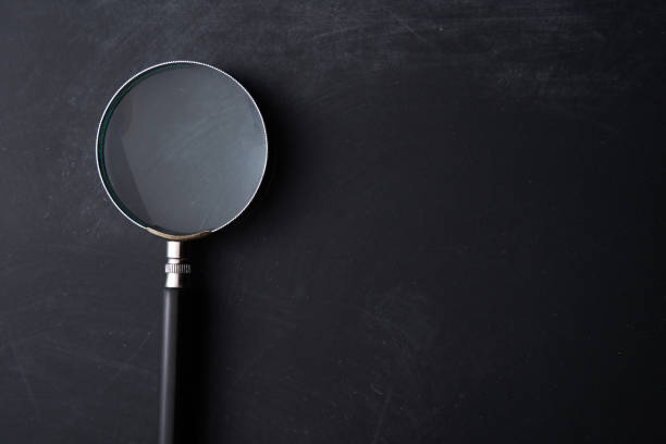 istock magnifying glass on the blackboard 1279624115