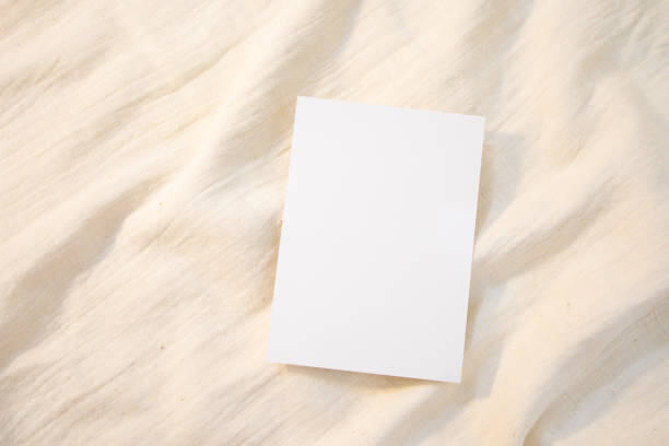 istock Blank Card Mockup designs in an authentic setting white greeting card artworks or stationery designs. empty paper card 1279625549