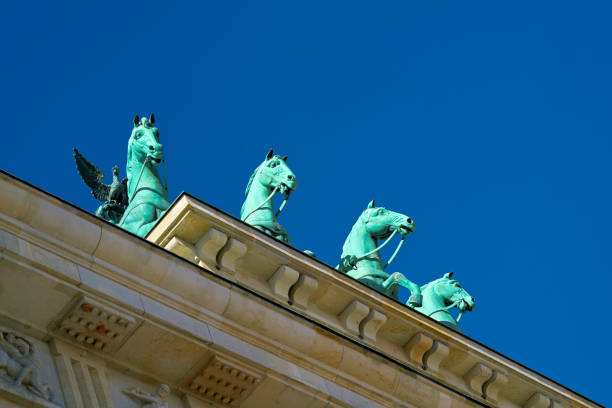 istock Quadriga at the Brandenburg Gate in Berlin seen from below 1279626246