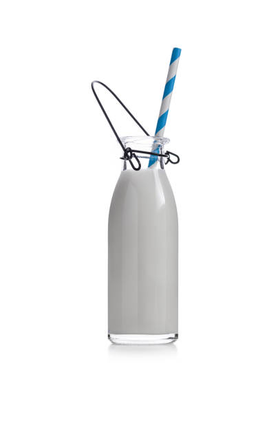 istock milk bottle with straw on white background 1279628793