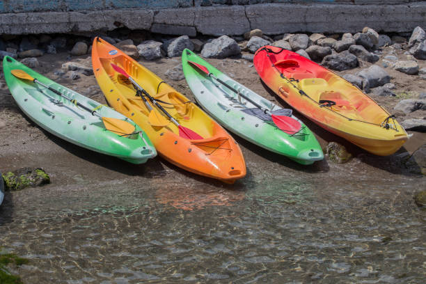 istock kayaks with oars on the seashore in summer 1279631685