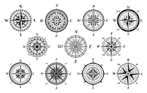 Nautical compasses vintage set. Wind rose medieval tools. Geographical marine navigation equipment. Nautical compasses vintage set. Wind rose medieval tools. Geographical retro marine navigation equipment for orientation at sea, ocean. Vector collection illustration isolated on white background. compasses stock illustrations