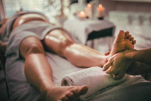 istock Pregnant woman having massage in spa relax 1279632034