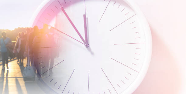 istock People walking overlay with time clock, business times concept. 1279633401