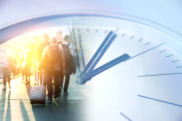 istock People walking overlay with time clock, business times concept. 1279633632