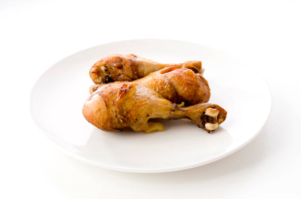 istock Grill Chicken Legs on white background 1279634730