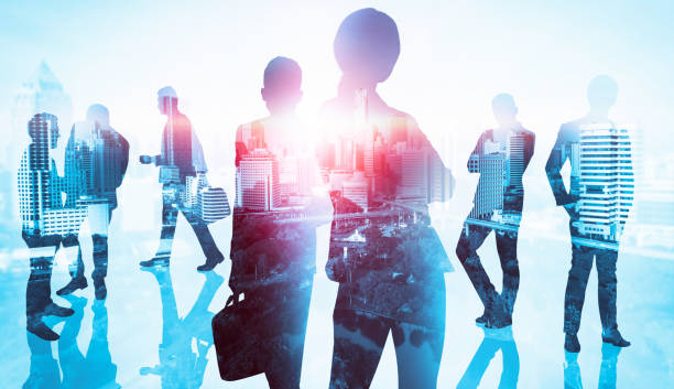 abstract image of many business people together in group on background of city - double exposure imagens e fotografias de stock