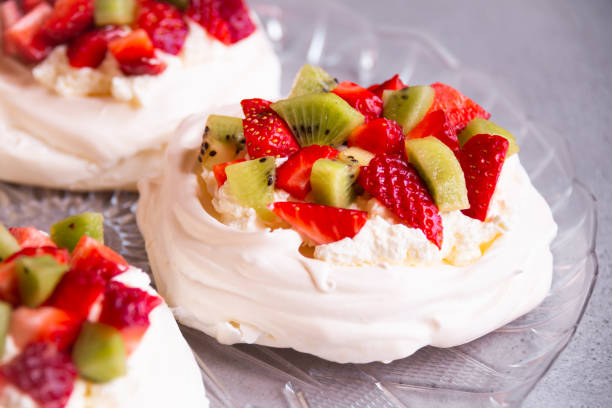 istock Delicious Pavlova cake with meringue and fresh fruit 1279642543