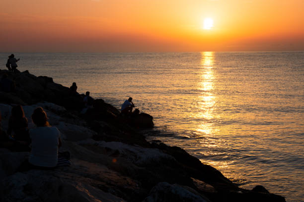 istock Beautiful orange sunrise or sunset at sea 1279643211