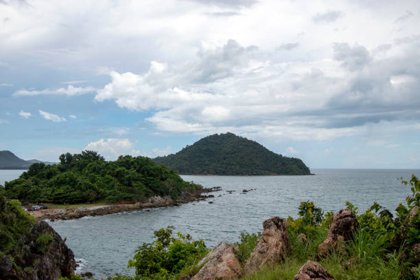 istock Beautiful natural scenery, sea and mountains with sky and clouds as background. 1279643861