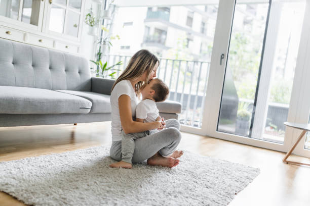 istock Mother and son playing in their living room 1279646416