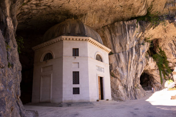 istock Church in a rock, catholic octagonal chapel in Italy 1279653179