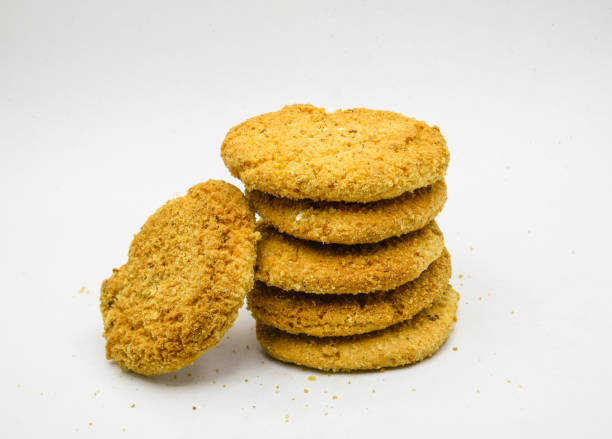 istock biscuits isolated on white background.Atta biscuit, cookies, white flour biscuit - Indian cooking 1279653916