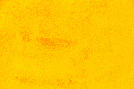 Textura de pared de cemento de yeso amarillo photo