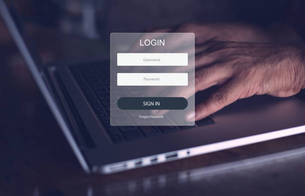 The login icon used for the website has a hand-printing on the laptop background. The login icon used for the website has a hand-printing on the laptop background. registration form photos stock pictures, royalty-free photos & images