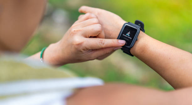 istock Female hand with fitness tracker 1279660249
