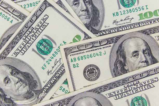 istock Background of american one hundred dollar bills 1279660445